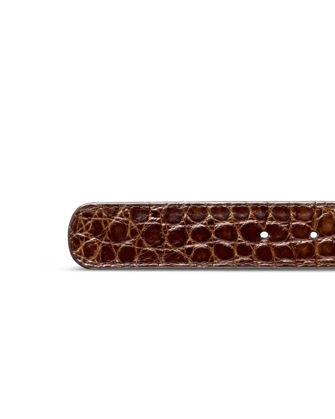 Brown leather crocodile textured belt against a black background.