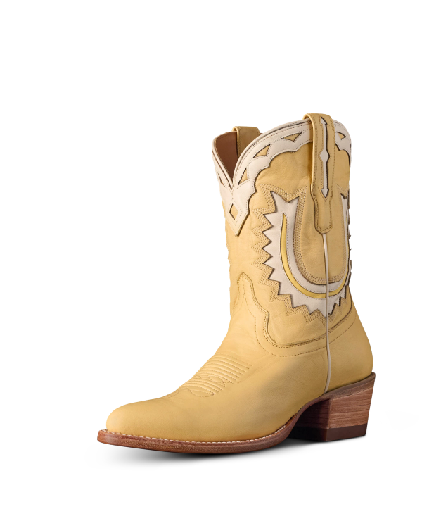 Quarterfront view of The Jolene - Pale Yellow Cowhide on plain background