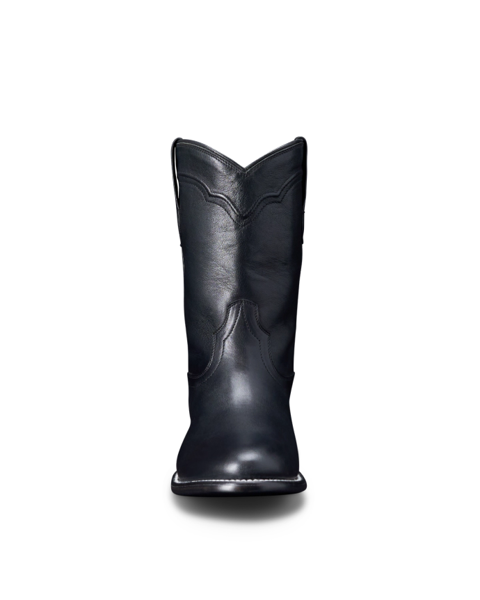 A single black cowboy boot is displayed against a black background, showing a front view with visible stitching details.