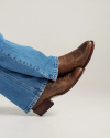 Closeup of man wearing The Cartwright in Cafe in a photo studio