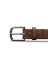 Brown leather belt with a silver buckle on a black background.