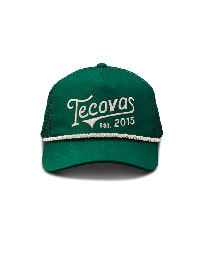 Quarterfront view of Tecovas Gameday Trucker - Green on plain background