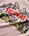 A Pink Tecovas t shirt against a plain background