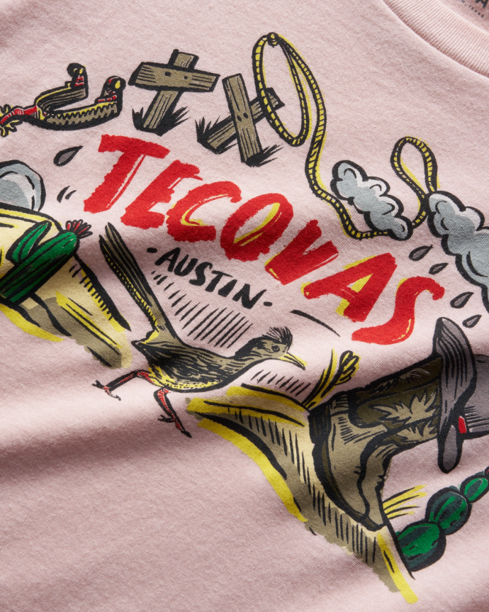 A Pink Tecovas t shirt against a plain background