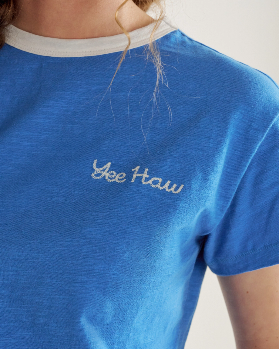 Front view of Women's Vintage Ringer Tee - Blue / White on model