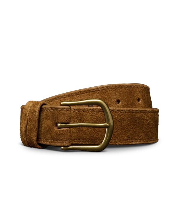 A brown suede belt with a brass buckle is coiled against a plain white background.