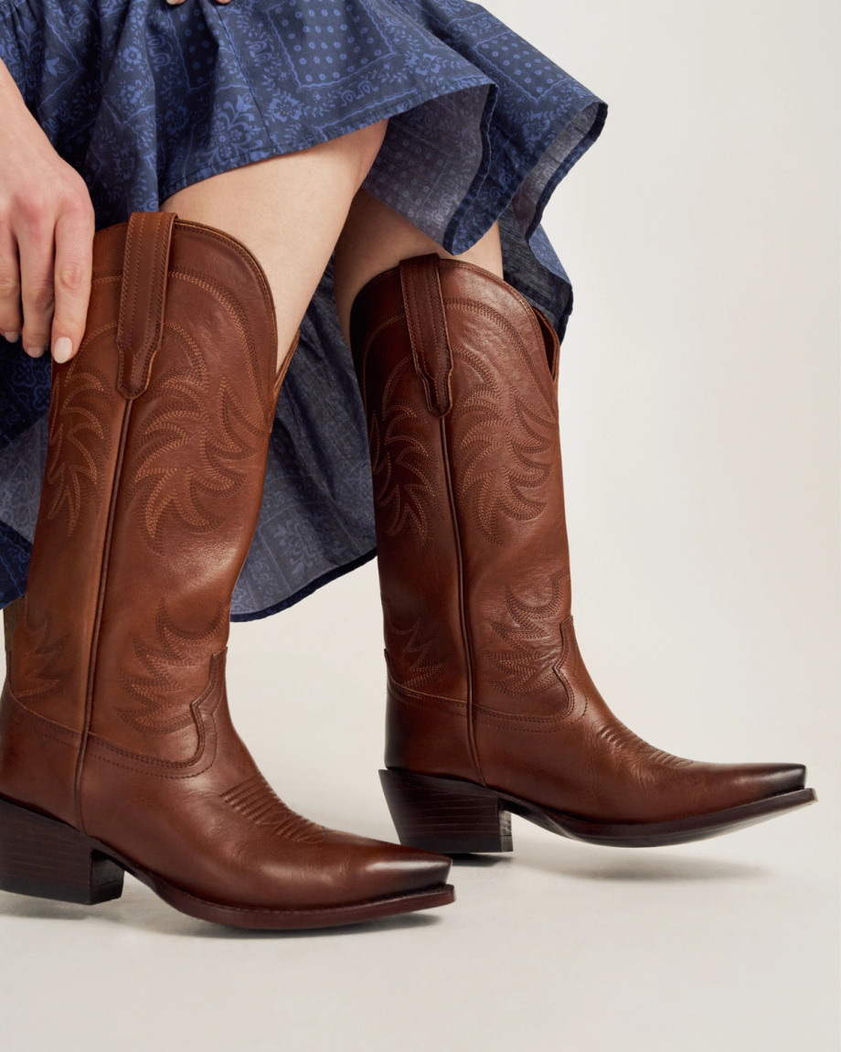 Closeup of woman in a photo studio sitting and wearing The Annie in Sequoia