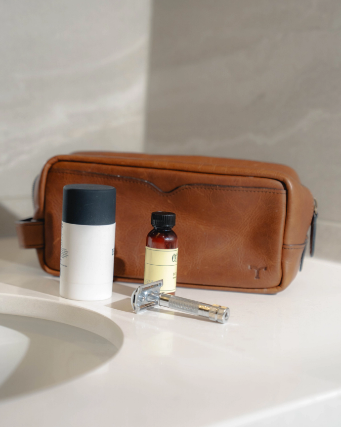 Image of The Bartlett Travel Kit on a bathroom counter.