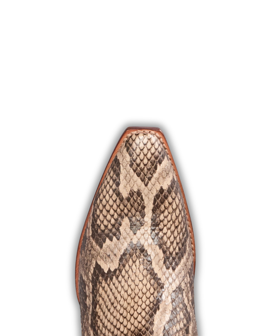The Loretta in Mangrove Invasive Python. Close-up of the pointed toe of a shoe with a brown and beige snakeskin pattern, reminiscent of the intricate scales of an invasive python, photographed against a white background.