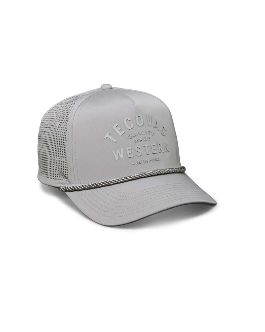 Quarterfront view of Quality Made Performance Trucker Hat - Gray on plain background