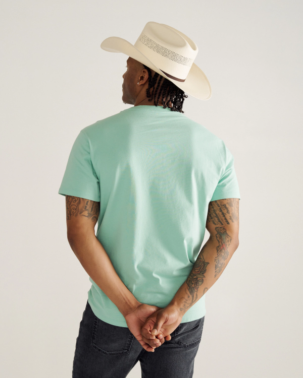 Back view of Men's Boot Company Tee - Teal / Black on model