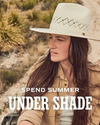 Woman wearing a straw hat in a jeep saying "Spend Summer Under Shade"
