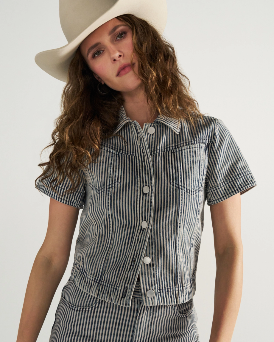 Front view of Women's S/S Denim Top - Blue / White on model