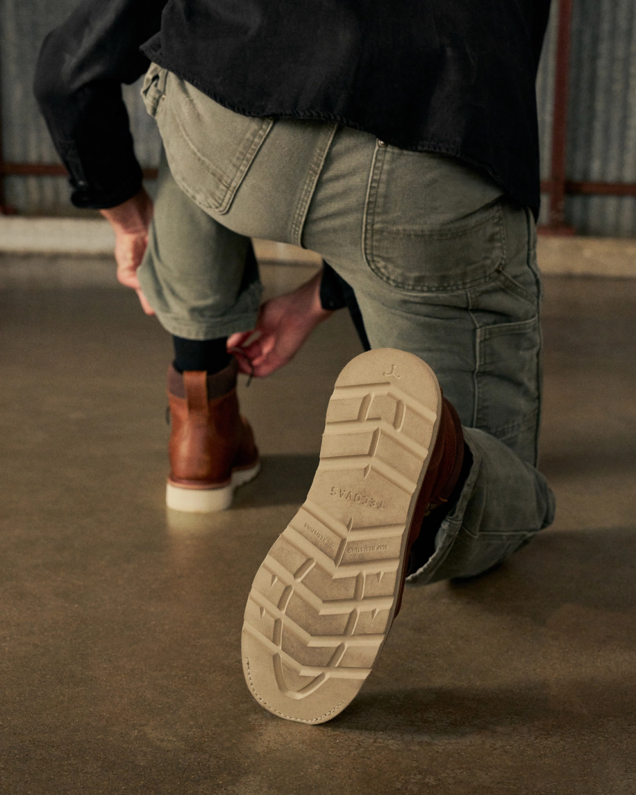 Toe view of The LH WP Moc Comp Toe Work Boot - Saddle Cowhide on plain background
