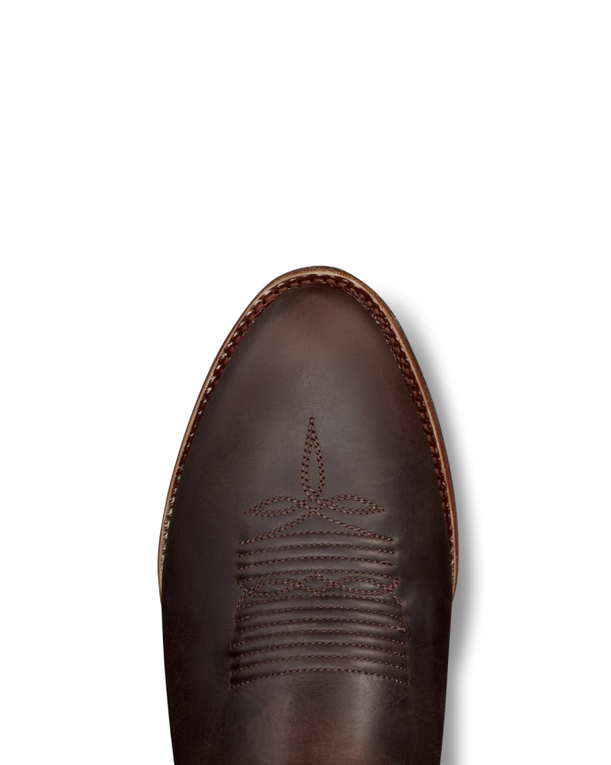 Toe view of The Buck - Molasses Cowhide on plain background