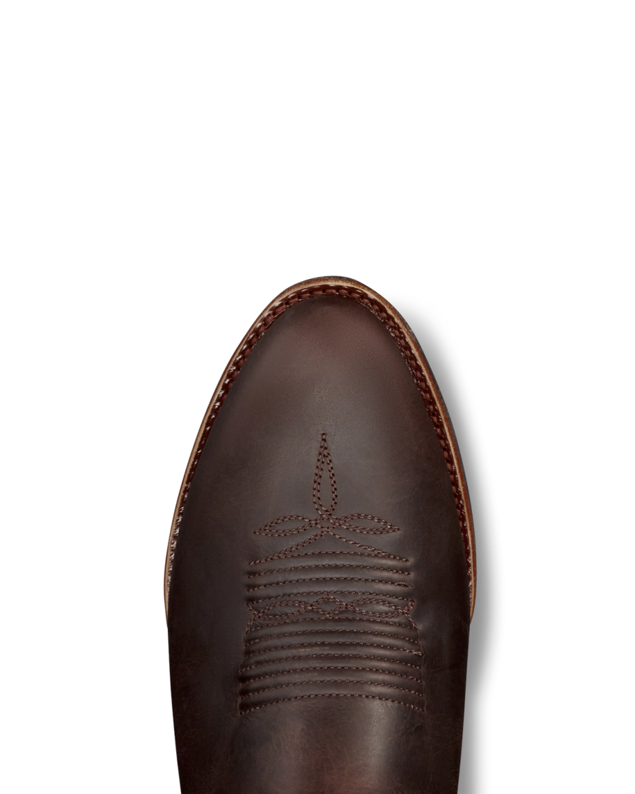 Toe view of The Buck - Molasses Cowhide on plain background