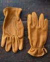 Pair of chore gloves lying on a table