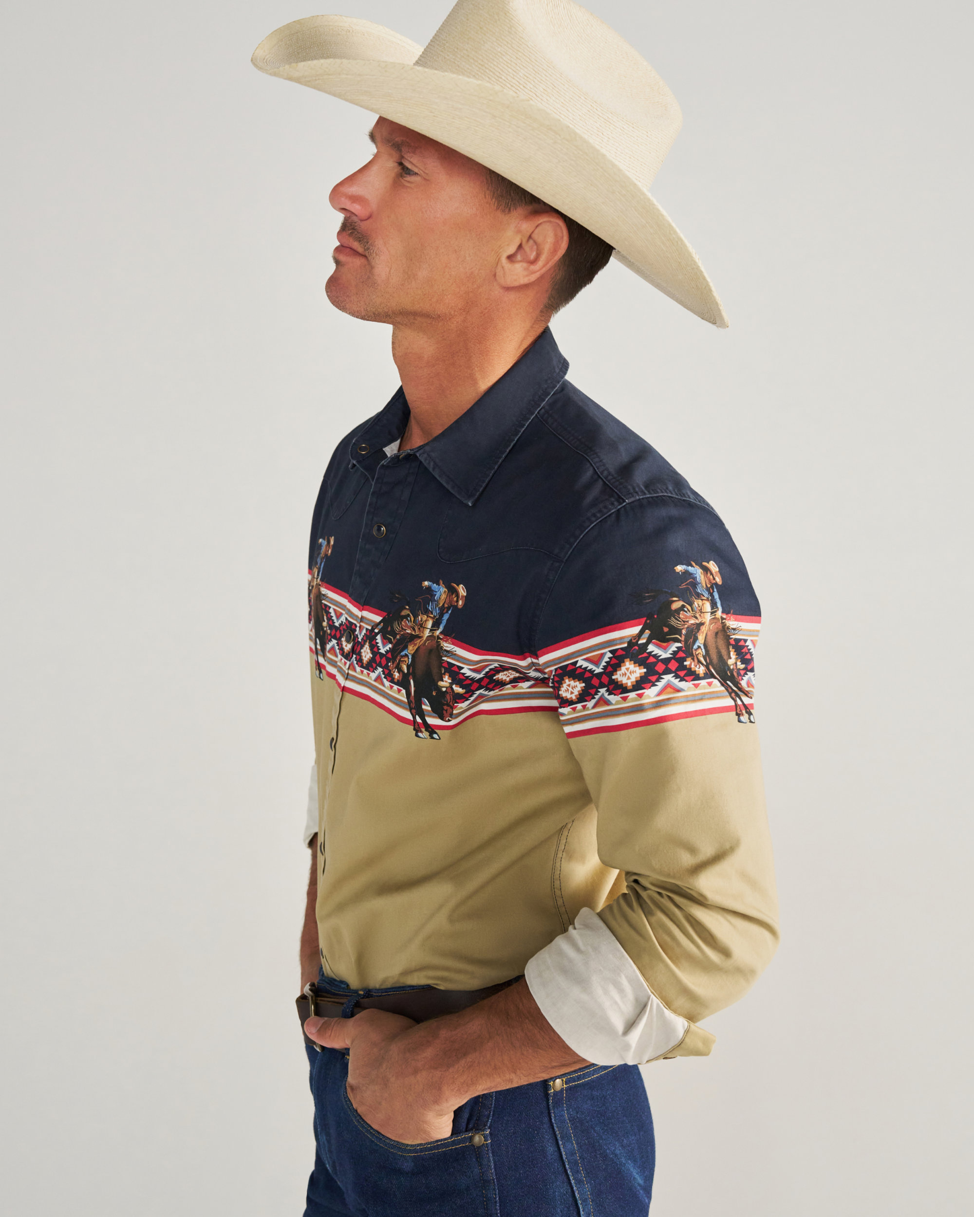 Closeup detail view of Men's Thorn Stopper Pearl Snap LS - Navy / Khaki