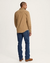 Back view of Men's Premium Relaxed Jeans - Medium on model