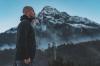 man staring at a mountain