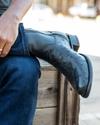 close up of Zane Midnight Black Zip Cowboy Boot on a man's feet 