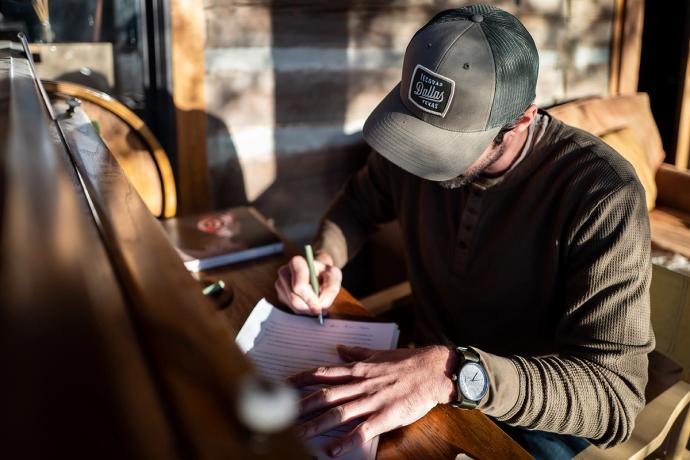  man editing a paper