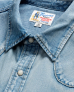 Closeup detail view of Men's Denim Pearl Snap LS - Light Wash