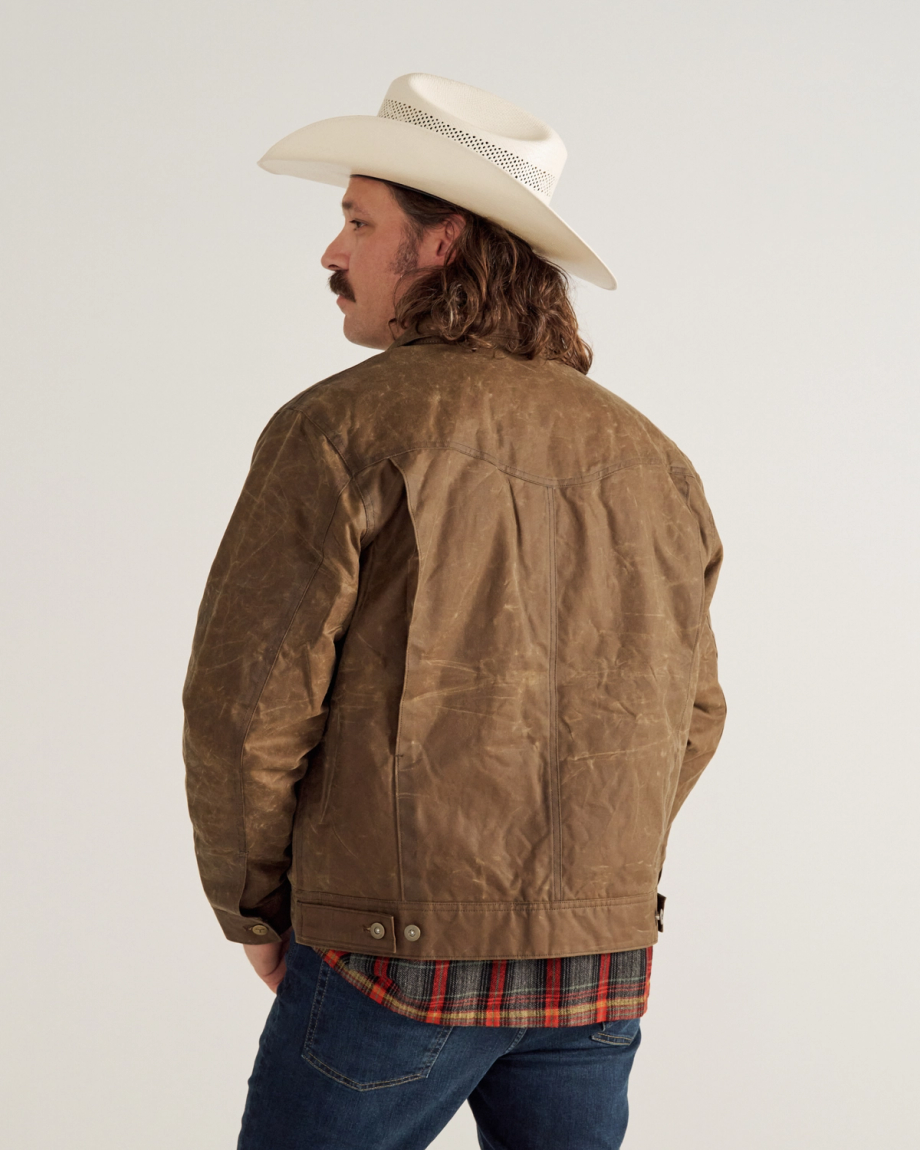 Back view of Buckaroo Waxed Canvas Trucker Jacket - Tobacco on model