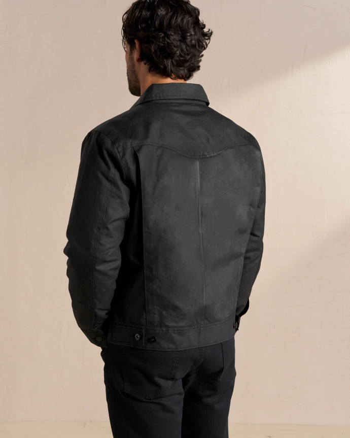 Back view of Buckaroo Waxed Canvas Trucker Jacket - Black on model