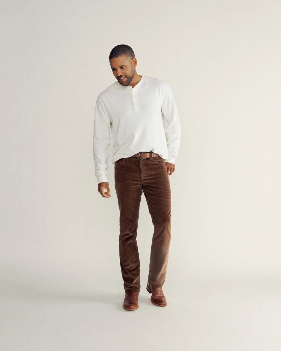 Full view of Men's Slim Straight Stretch Corduroy - Brown on model