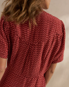 Up close view of the back on the Women's Short Sleeve Button Front Midi Dress in the color Multi Geo Floral Stripe.