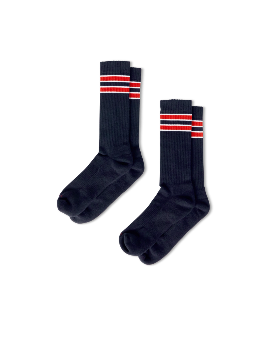 Quarterfront view of Mid-Calf Performance Socks (2-Pack) - Navy / Red on plain background