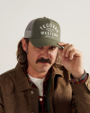 Man wearing the olive trucker hat 