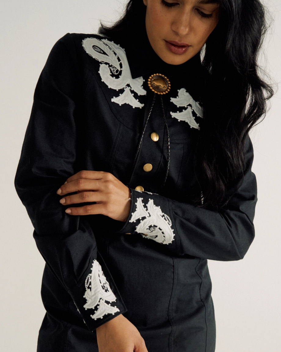 Closeup detail view of Women's L/S Applique Mini Dress - Black