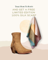 Advertisement showcasing a brown suede boot with fringe details, next to a pastel-colored silk scarf, with the text "treat mom to boots and get a free limited edition 100% silk scarf.