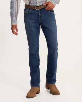 man wearing premium standard jeans in medium blue wash