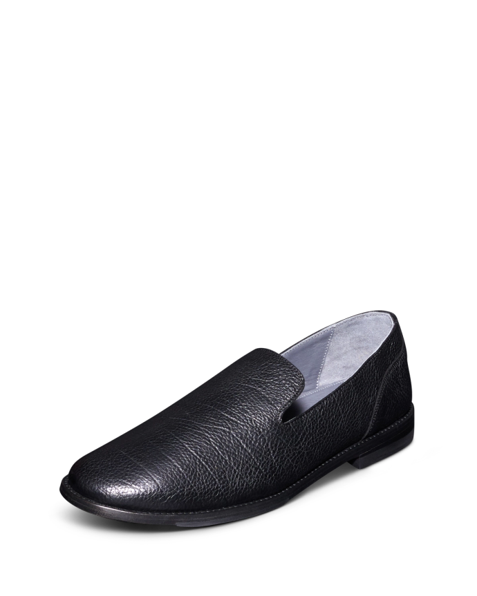 Quarterfront view of the outside of the monterrey midnight slip on. 