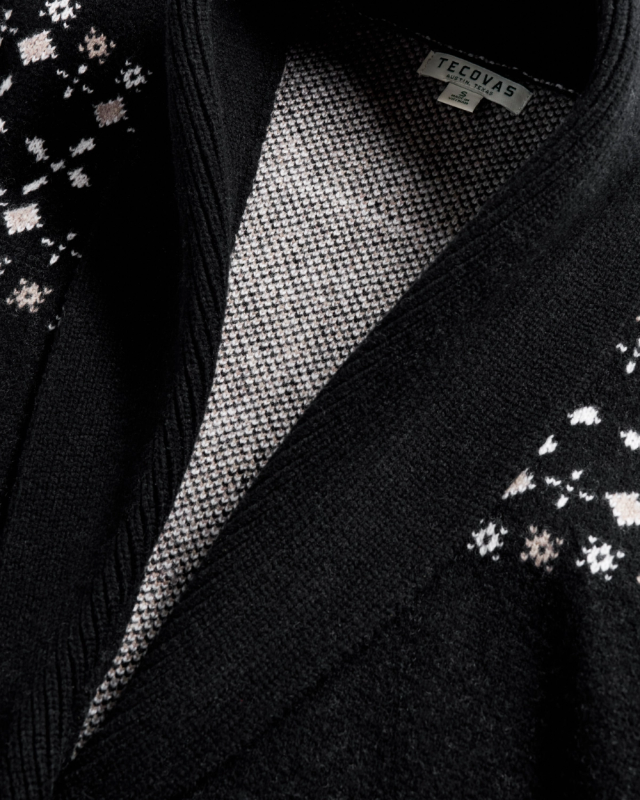 Closeup detail view of Women's Shawl Collar Wrap Sweater - Black / White