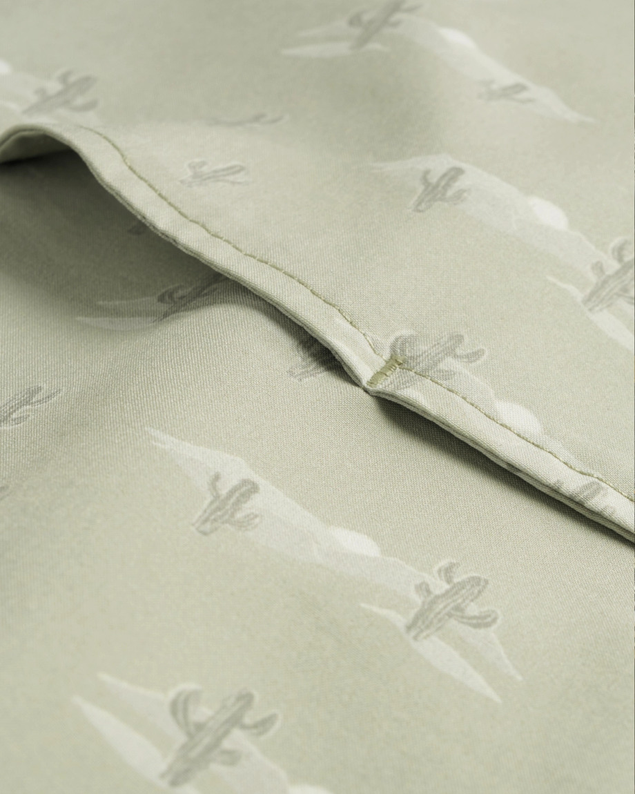 Closeup detail view of Men's Performance Western Short Sleeve Pearl Snap - Desert Sage/Light Sand