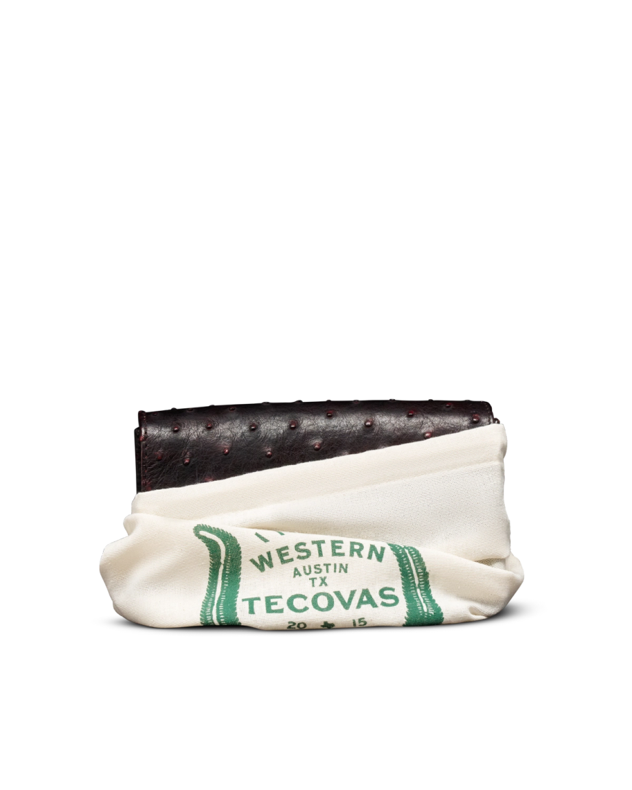 Closeup view of Concho Chain Crossbody - Black Cherry