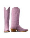 A pair of lavender suede cowboy boots with pointed toes, wooden heels, and stitched patterns, shown from side and front angles.