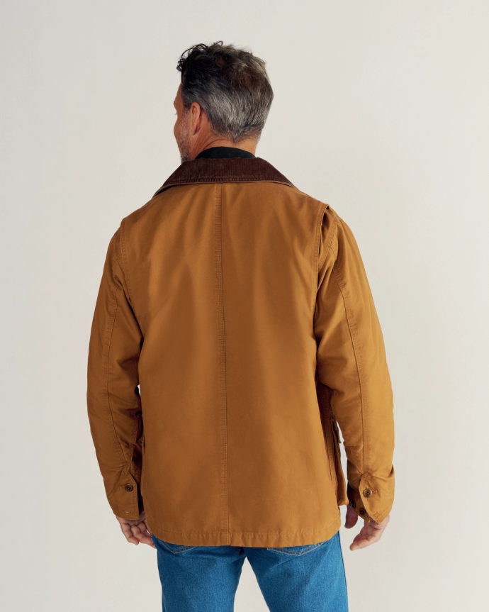 Back view of Men's Barn Coat - Saddle on model