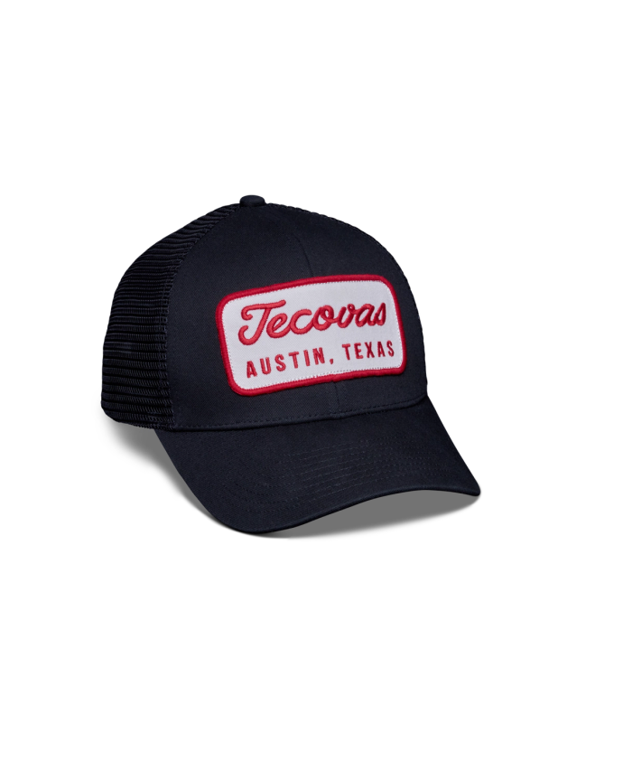 Quarterfront view of Mechanic 6-Panel Mid Pro Trucker - Black on plain background