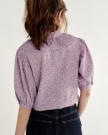 Back view of Women's Split Neck Top - Purple on model