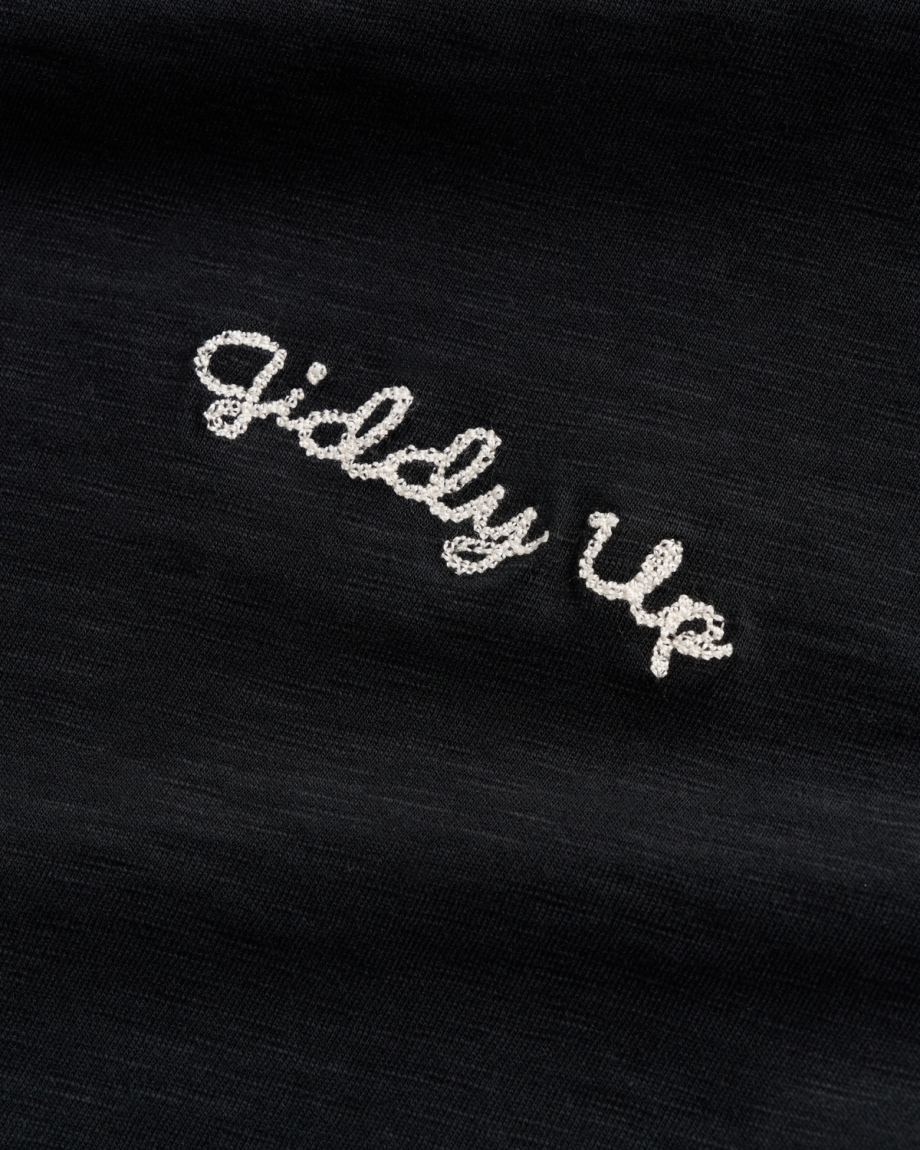 Closeup view of Women's Vintage Ringer Tee - Black / Bone