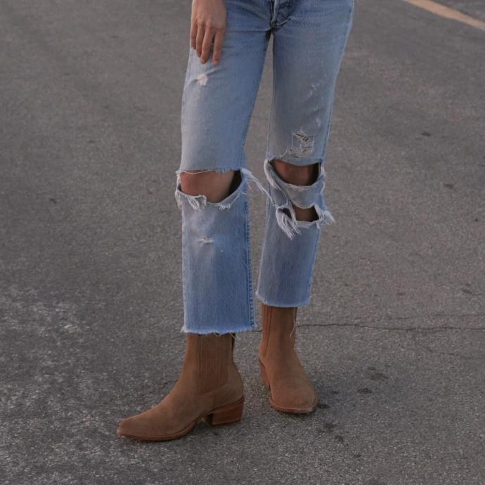 woman wearing the taylor latte tan suede booties