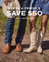 Two people standing on a dirt path; one in jeans holding a cowboy hat, the other in denim shorts. Both are wearing cowboy boots. Text reads: "Refer a friend & save $50 for a limited time.