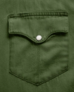 Closeup detail view of Men's Denim Long Sleeve Pearl Snap - Hunter Green