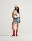 Full view of The Sadie - Barn Red Suede on model