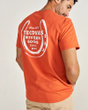 Closeup detail view of Men's Horseshoe Pocket Tee - Orange / Bone